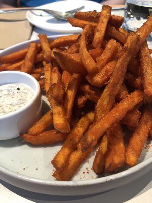 Freshly fried sweet potato fries with truffle Mayo. Hot and crispy on the outside, soft on the inside. Just the way I like it! at Green Common 绿客门 in Central Singapore