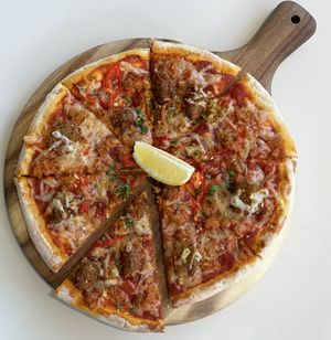 Spicy Omnituna and Omni Crab Cake Pizza  at Green Common 绿客门 in Central Singapore