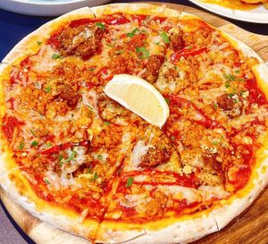 🌱Spicy Omnituna and Omni Crab Cake Pizza $16  at Green Common 绿客门 in Central Singapore