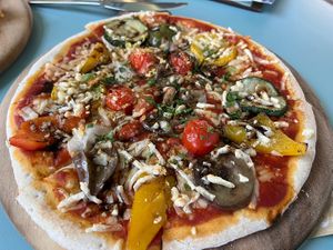 Pizza  at Green Common 绿客门 in Central Singapore