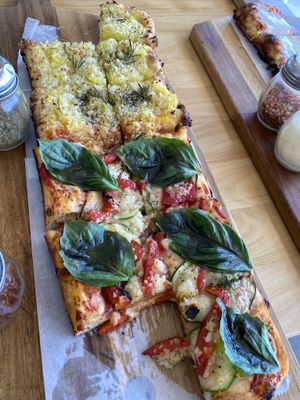 Potato/rosemary pizza & basil/zucchini/red pepper pizza   at FARO Beachside Eatery in Flagler Beach