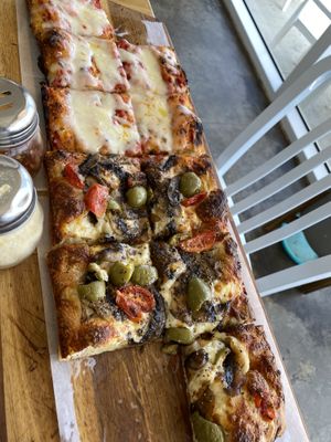Margarita pizza & olive pizza   at FARO Beachside Eatery in Flagler Beach