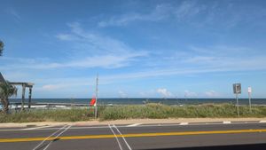 Beach view from the sidewalk at FARO Beachside Eatery in Flagler Beach