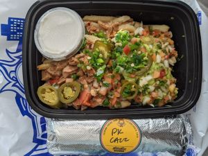 Sisig fries and Cali burrito. at Senor Sisig in Oakland
