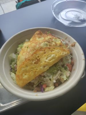 Just egg added to bowl at Senor Sisig in Oakland