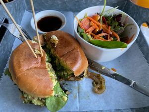 Pesto marinated Portobella burger, avocado, pepperjack , organic spinach, cilantro aioli, salad at De Leon Latin Cocina in St Augustine