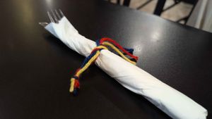 Even the silverware is decorated with the colors of the Colombian flag at De Leon Latin Cocina in St Augustine
