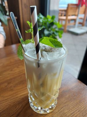 A mixed drink with coconut milk, passionfruit and mint at Sen Vegan Cuisine - Moorenstraße in Dusseldorf