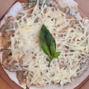 Mini truffle pizza with gluten-free crust at Wild & The Moon - Demours in Paris