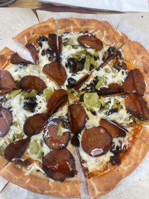 Vegan - crust, cheese, pepperoni, sausage,  olives and green chilis.   at Beau Jo's in Arvada