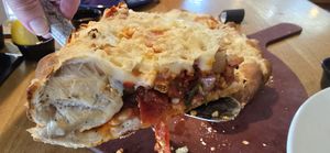 Vegan sausage and Vegan pepperoni pizza with added calabrian chili peppers and pineapple. at Beau Jo's in Arvada