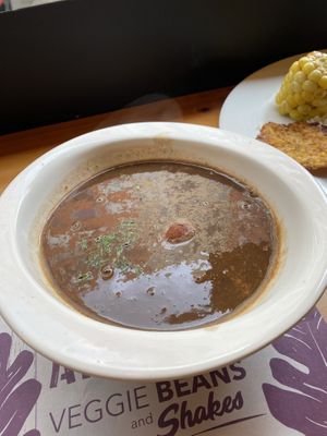 Black beans casserole with ripped plátano balls  at Veggie Beans and Shakes in Bogota