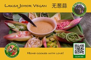 Laksa Johor Vegan 无葱蒜  a slight twist from the traditional Laksa Johor Classic, our vegan Laksa Johor is without onion/garlic and comes with creamy coconut and plant based laksa gravy served with Asian Herbs, moringa  tempeh balls and  sambal. at Hawa's Artisan Kitchen in Lahad Datu