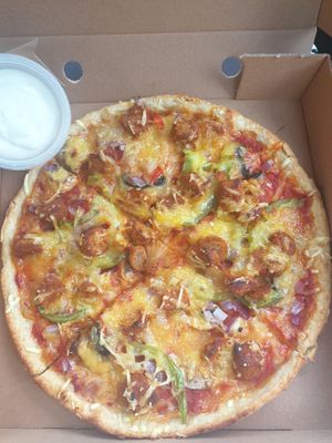 Vegan chicken Tikka pizza at Savage Slice in Renfrew