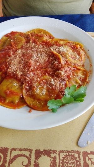 Handmade basil and tomato raviolis at Veg and Veg in Turin