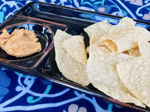 Nachos & dip! Don’t let its simple looks fool you..this is the booommbb!! at Capri Island Bakery Cafe in Laguna