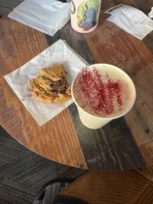Choc chip cookie and oat milk lattee  at Coat Check Coffee in Indianapolis
