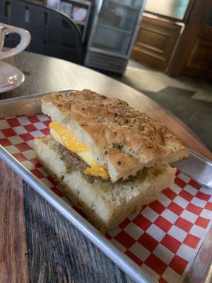Veg breakfast sandwich can be made vegan, as shown here. Have oat milk for .75 up charge. Several baked goods all made in house.   at Coat Check Coffee in Indianapolis