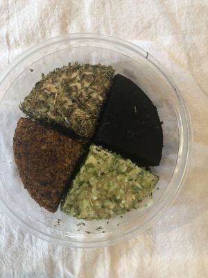 Four types of cheeses  at Divine Treasures in Manchester