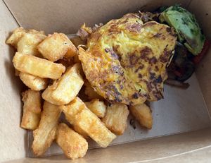 Vegan chorizo, vegan fried egg, and yucca fries  at Roasted and Raw in Oakland