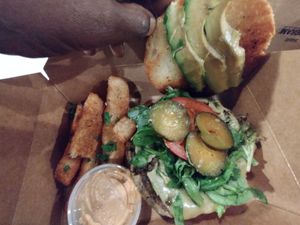 Blk bean burger n yucca fries $15!!! at Roasted and Raw in Oakland