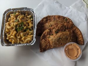 Empanadas and mac & cheese at Roasted and Raw in Oakland