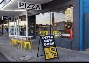 Indoor and outdoor pizza shop at 8 Slices Pizza in Strathmore