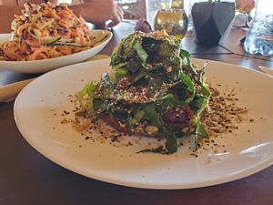 Raw pizza, pad thai (in the background) at Tierra Verde in Mahahual