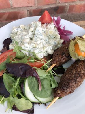 Grilled scewers with fresh potato salad  at Kafe Stadsparken Huskvarna in Jonkoping