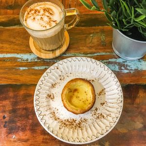 Pastel de nata Vegan and coffee with soya and Organic milk  at Vizzio Cafe in Lisbon