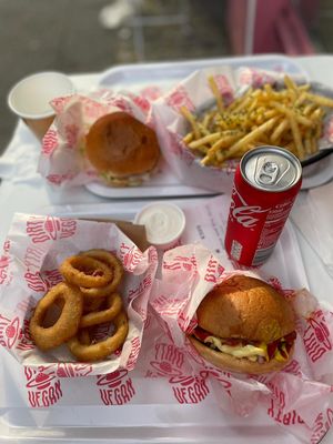 Classic burger and onion rings in the front and notorious B.I.G and garlic fries in the back. I really recommend the burgers. at Dirty V - Bergen in Bergen