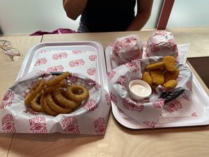 Two burgers, nuggets and onion rings  at Dirty V - Bergen in Bergen