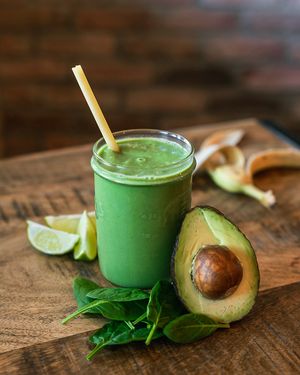 Moringa Smoothie made with fresh avocado, spinage, lime, banana. Comes with a choice of either milk, apple juice or coconut water.  at Fjaka in Amsterdam