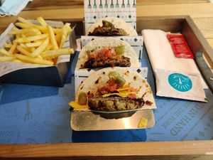 Vegan Mexican burgers in tortillas at Free The Fork in Amman