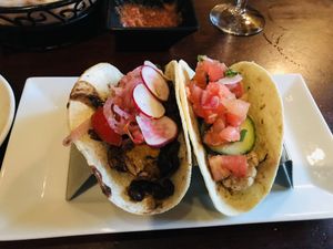 Tacos: the vegan with black beans and Brussels, and the vegetarian with roasted cauliflower   at Flying Iguana in Neptune Beach