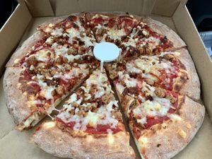 Loaded meat pizza: Daiya cheese, soy sausage, soy chicken, soy pepperoni & soy chorizo. at Vegan Korner in Grand Terrace