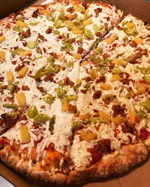 Pizza with Peppercorns pineapple  at Vegan Korner in Grand Terrace