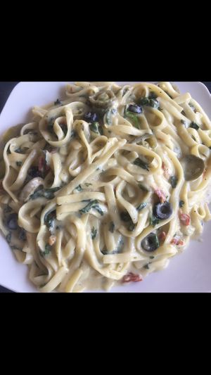 Fettuccine Alfredo with sun-dried tomato, jalapeño, spinach and olive!!  at Vegan Korner in Grand Terrace