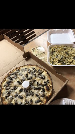 Ranch sauce pizza with mushrooms and fettuccine Alfredo at Vegan Korner in Grand Terrace