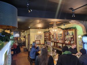 Cozy restaurant with bar and table seating at Farmacy+Fermentary in Charlottetown