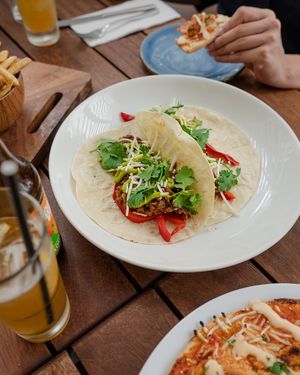 Fajitas and chick-un pizza at The Stables Whitford in Auckland