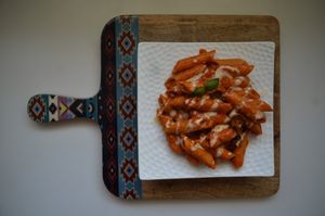 Penne alla Marinara :

Penne cooked in a rich cashew cream sauce made with tomatoes,cashews,minced garlic,oregano and pepper
 at CraveLok in Pune