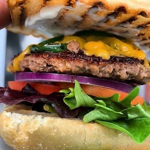 Quarter pound jalapeno cheddar burger! Seasoned and grilled to perfection with fresh crisp veggies - vegenaise on a grilled ciabatta brushed in a rosemary thyme olive oil. at Pucker Up - East Central, Space Coast, Orlando in Cocoa