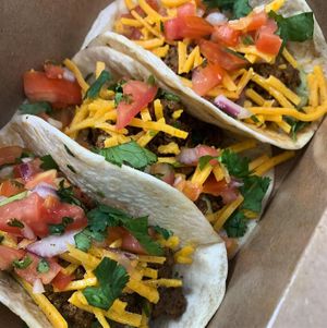 3 Street tacos drizzled in our avocado crema - impossible grounds seasoned with Christos special blend  - vegan cheddar - and topped with fresh pico!  at Pucker Up - East Central, Space Coast, Orlando in Cocoa