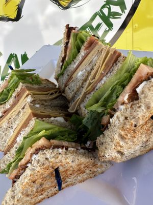 Club Sandwich - fresh baked bread, cheddar, lettuce, tomato, mayo, deli meat from The Kind Cleaver and house made bacon 🙌🏼  at Pucker Up - East Central, Space Coast, Orlando in Cocoa