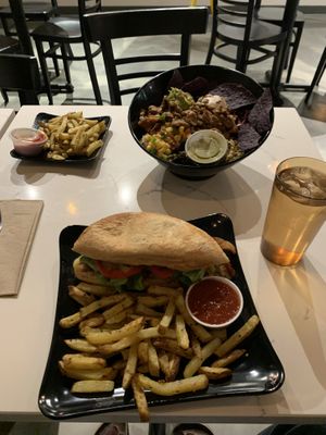 Smoked tempeh sandwich with baked fries; Aztec bowl with brown rice and baked fries . at Copper Branch in Nashville