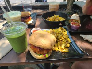 Nashville Hot Chicken Sandwich w/ Fries and a Gandhi smoothy at Copper Branch in Nashville