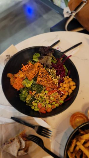 Asian Fusion Bowl
Bowl with edamame, bruschetta, mung beans, kimchi, black sesame, chickpeas, broccoli, beets, carrot, lettuce, general tao sauce. at Copper Branch in Nashville