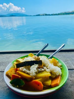 The view, with a bowl of curry. at Tamachat Vegan Food - ธรรมชาติ in Koh Samui