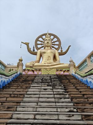 Buddha next to the restaurant at Tamachat Vegan Food - ธรรมชาติ in Koh Samui